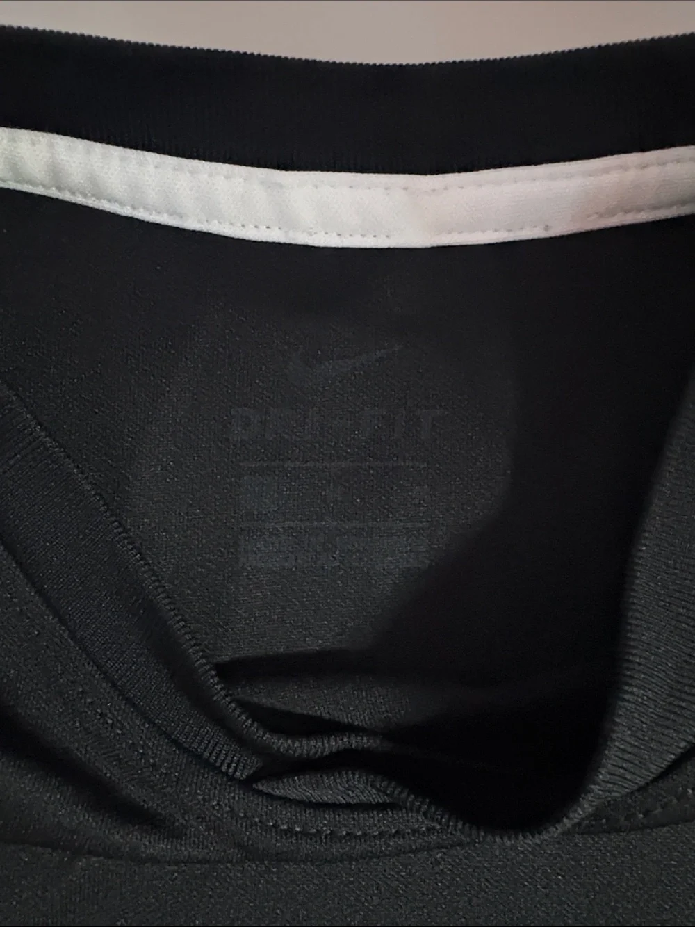 Nike Dri-Fit Black Short-Sleeve Athletic Tee with White Swoosh